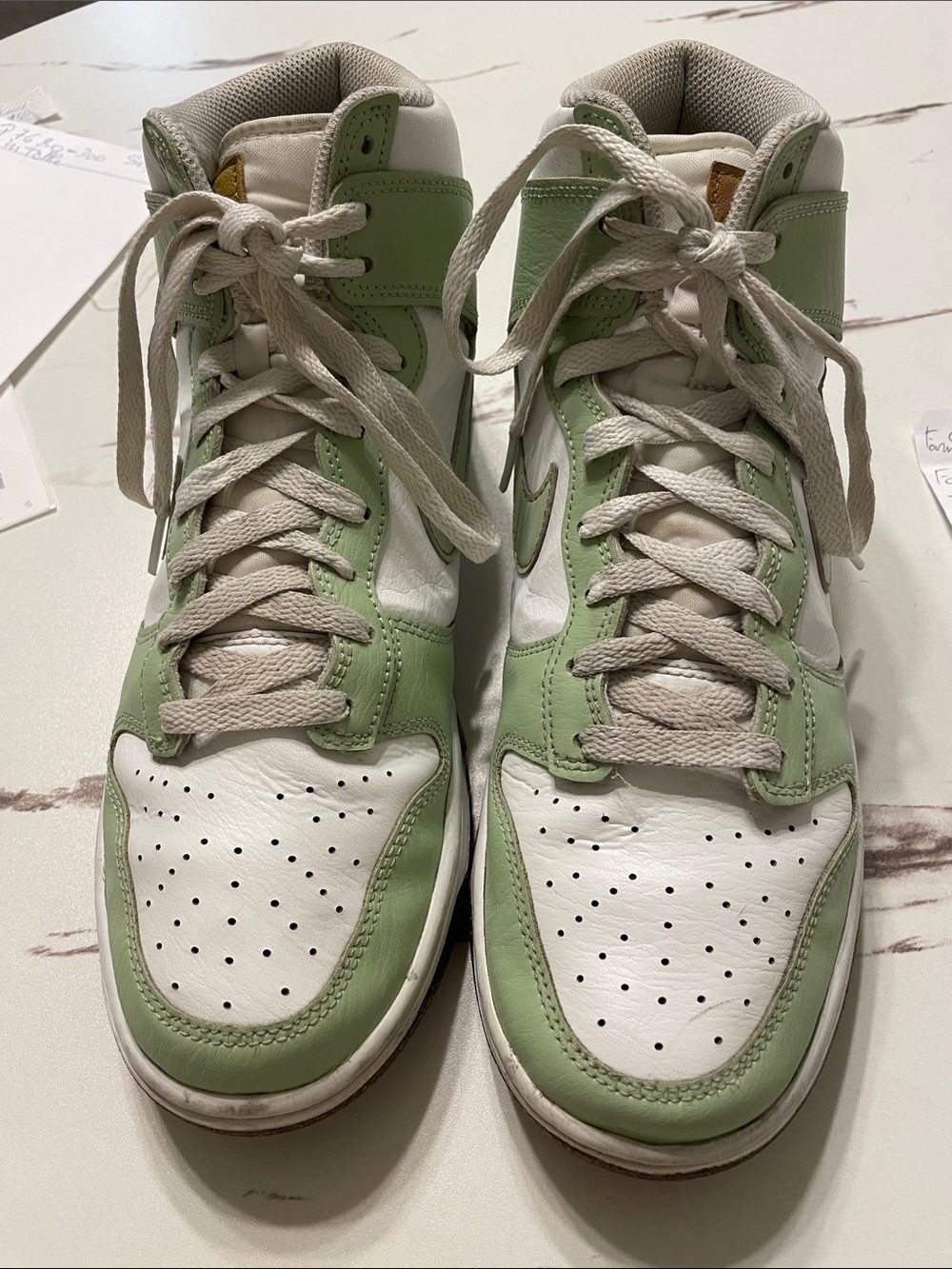 Nike Dunk SE Man High-Top Sneakers in White and Pale Green Inspected by Swoosh